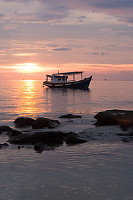 Tour Boat At Sunset