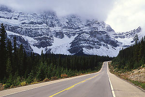 Snowy Mountains Behind Road