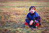 Kayla Sitting In Wet Grass