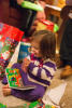 Lexi Clapping While Reading Book