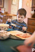 James Helping Make Pizza