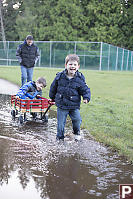 James Splashing Into Puddle