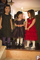 Three Girls At The Top Of The Stairs