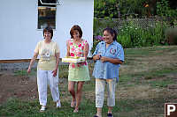 Daughters Bringing Out Cake