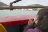 Claira Peaking Over The Edge Of The Boat