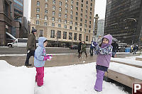 Claira And Nara Playing In Downtown Snow