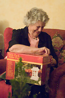 Grandma Tearing Into Gift