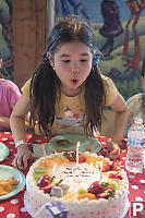 Nara Blowing Out Candles