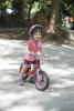 Claira Grinning On Her Bike