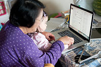 Grandma Showing Nara How To Use Computer