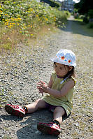 Nara Sitting Playing With Rocks