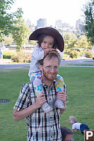 Abby On Jesses Shoulders With His Hat