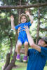 David Lifting Noelle Into Tree