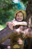 Noelle Smiling On Tree Branch