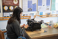 Claira On Old Typewriter