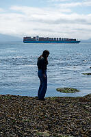 Claira With Freighter Behind Her