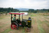 Marcus Driving The Tractor In Front Of The Turkeys