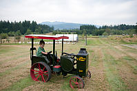 Marcus Driving The Tractor In Front Of The Turkeys