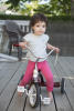 Claira On Her Tricycle