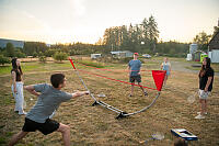 Playing Badminton At Sunset