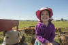 Claira Riding On Hay Bales