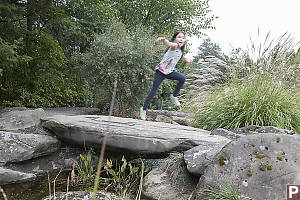 Nara Floating Over Stone Bridge