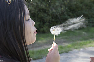 Claira Blowing Dandelion Long Exposure