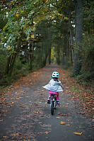 Nara Biking Down Forest Path