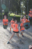 Claira Swinging At Playground