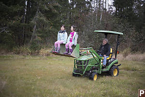 Lifted High In Tractor Bucket