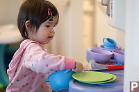 Nara Playing In Kitchen