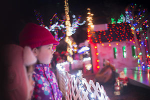 Nara And Claira Looking At Santa House