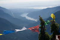 Budhist Prayer Flags With AView Of Vancouver