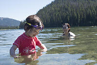 Claira Swimming With Mommy Behind