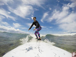 Nara Standing On Board With Wave