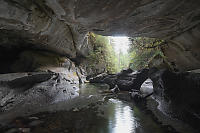 Sculpted Rocks At Cave Mouth