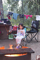 Claira Watching The Campfire